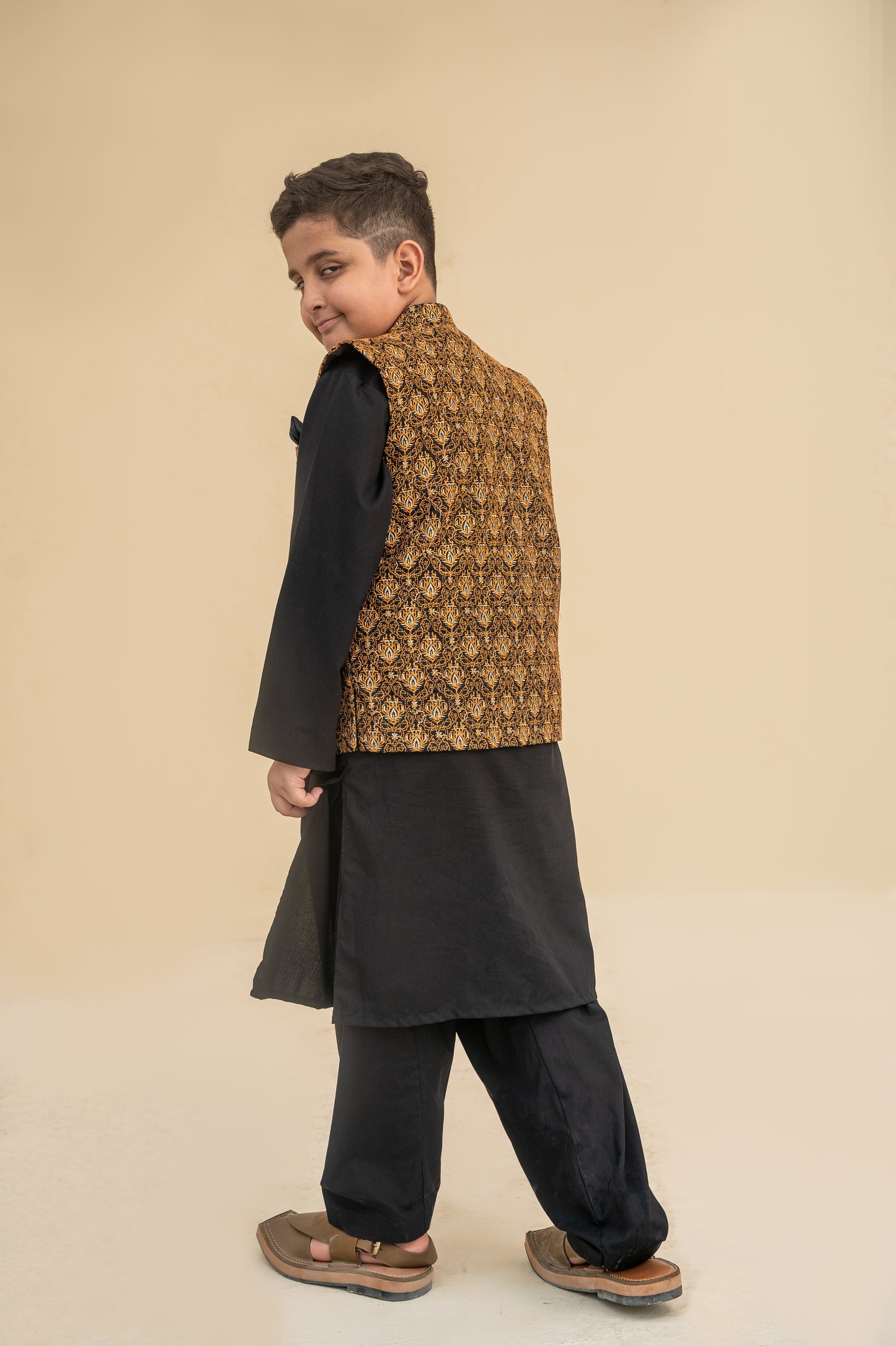 Black kurta shalwar with waistcoat.B4009