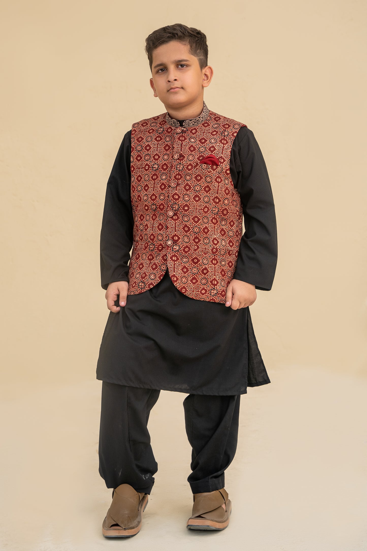 Black kurta shalwar with waistcoat.B3092