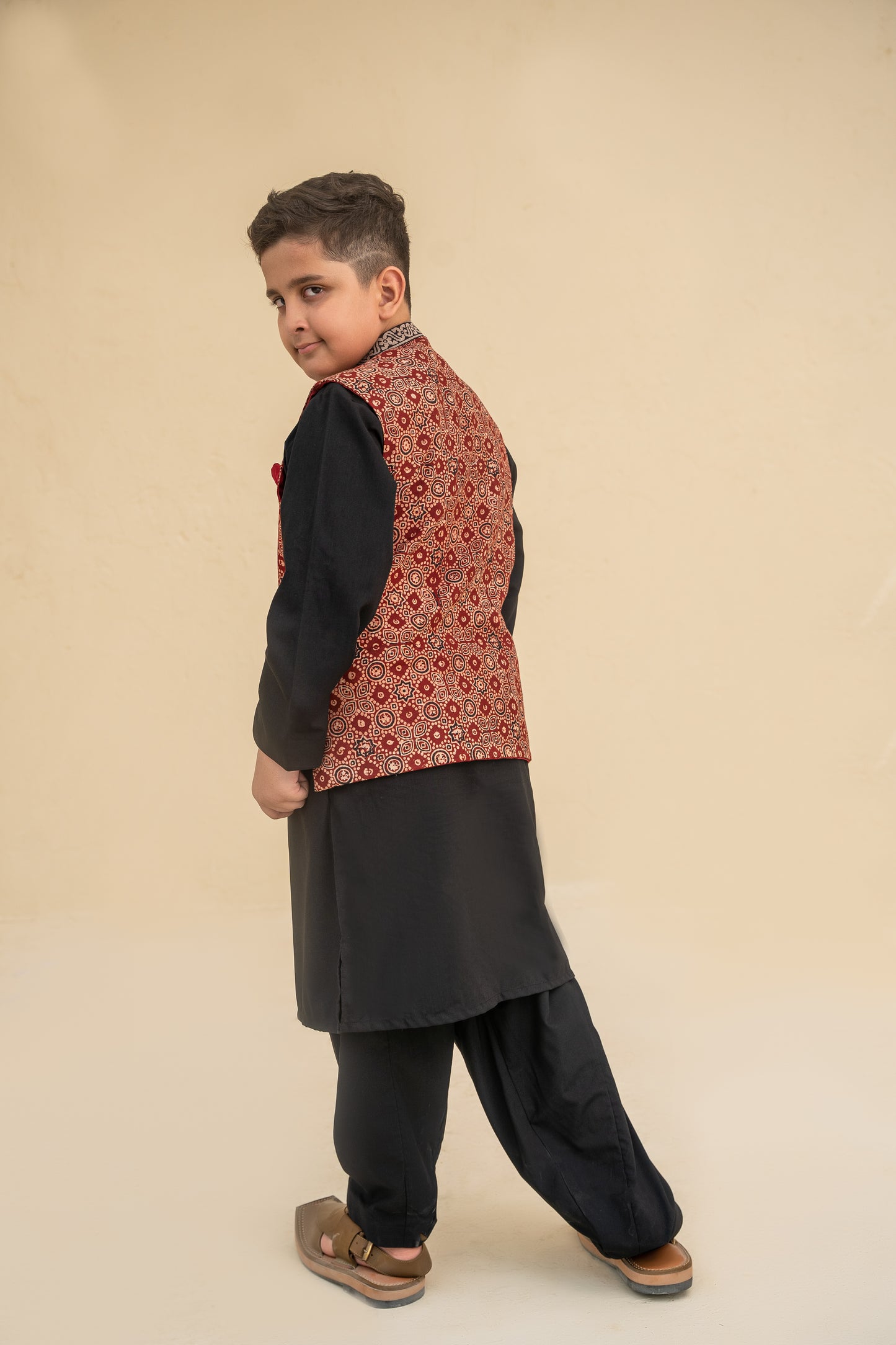 Black kurta shalwar with waistcoat.B3092