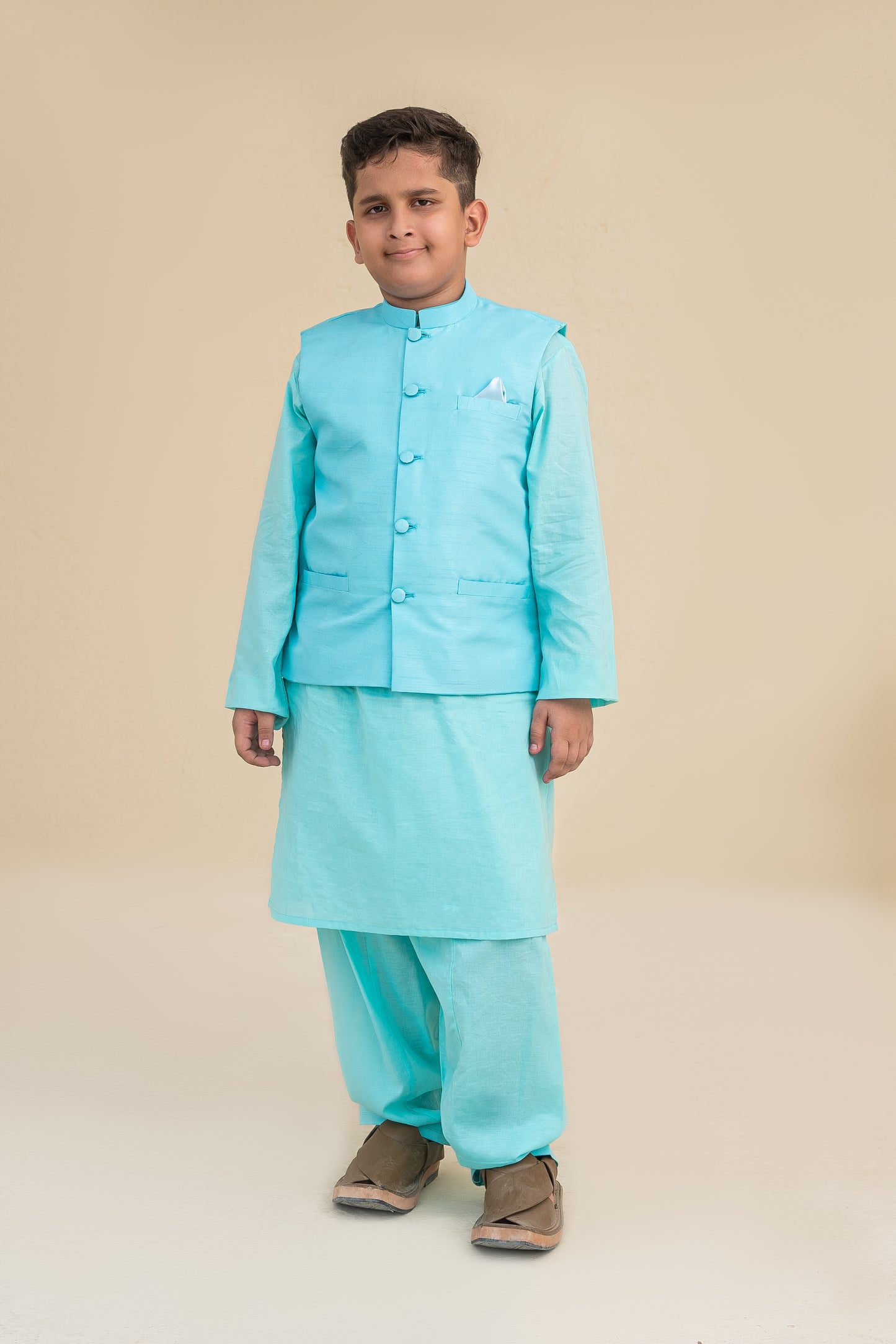 Peacock blue kurta shalwar with waistcoat. B3090