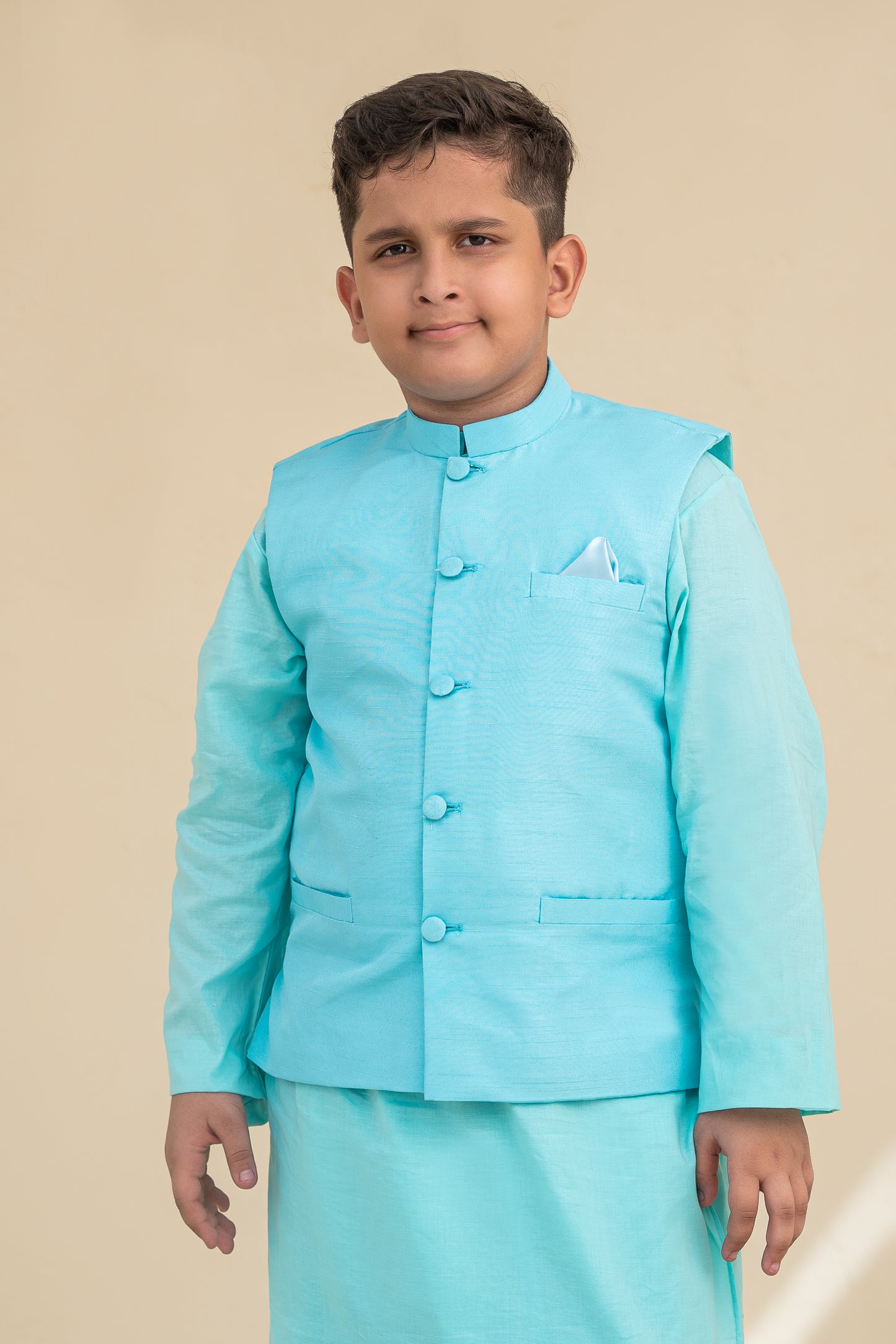 Peacock blue kurta shalwar with waistcoat. B3090