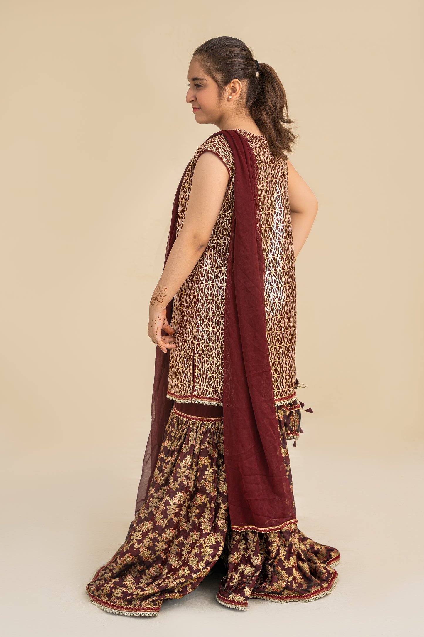 4 - piece embroidered Gharara Suit with Dupatta and Batwa.