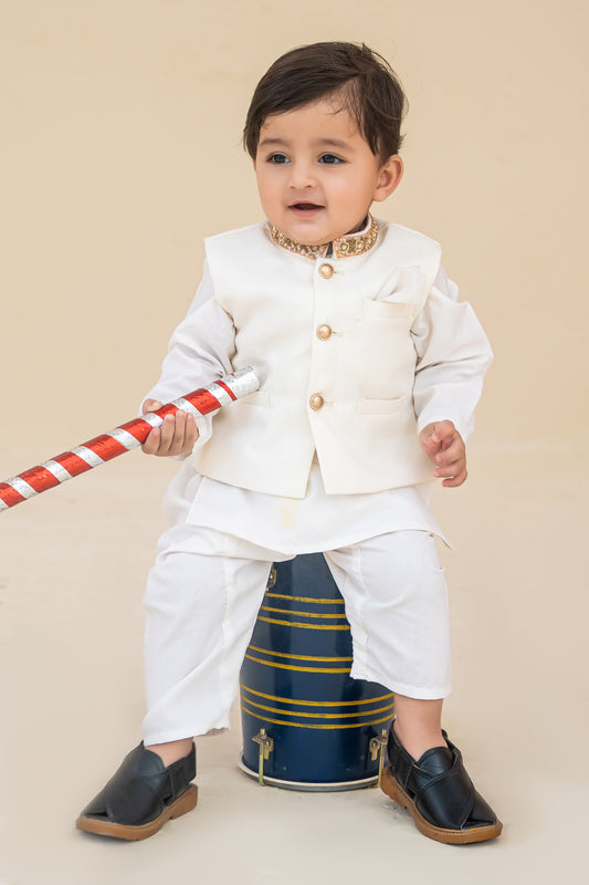 White kurta shalwar with hand embroidered waistcoat.B4005