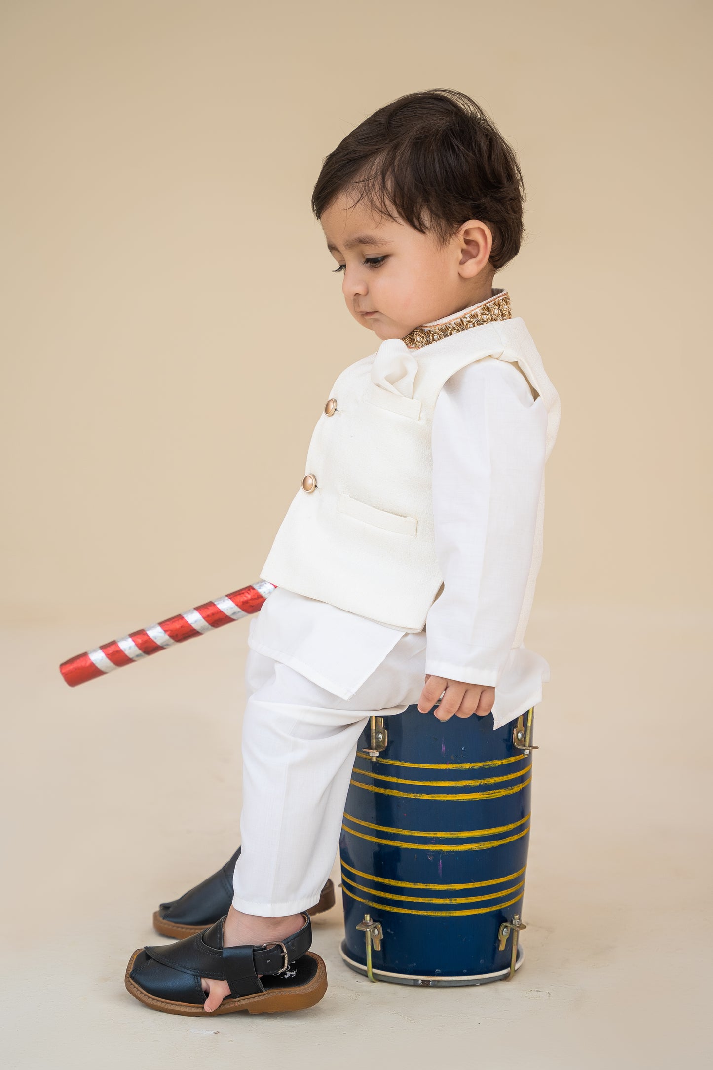 White kurta shalwar with hand embroidered waistcoat.B4005