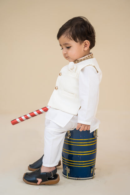 White kurta shalwar with hand embroidered waistcoat.B4005