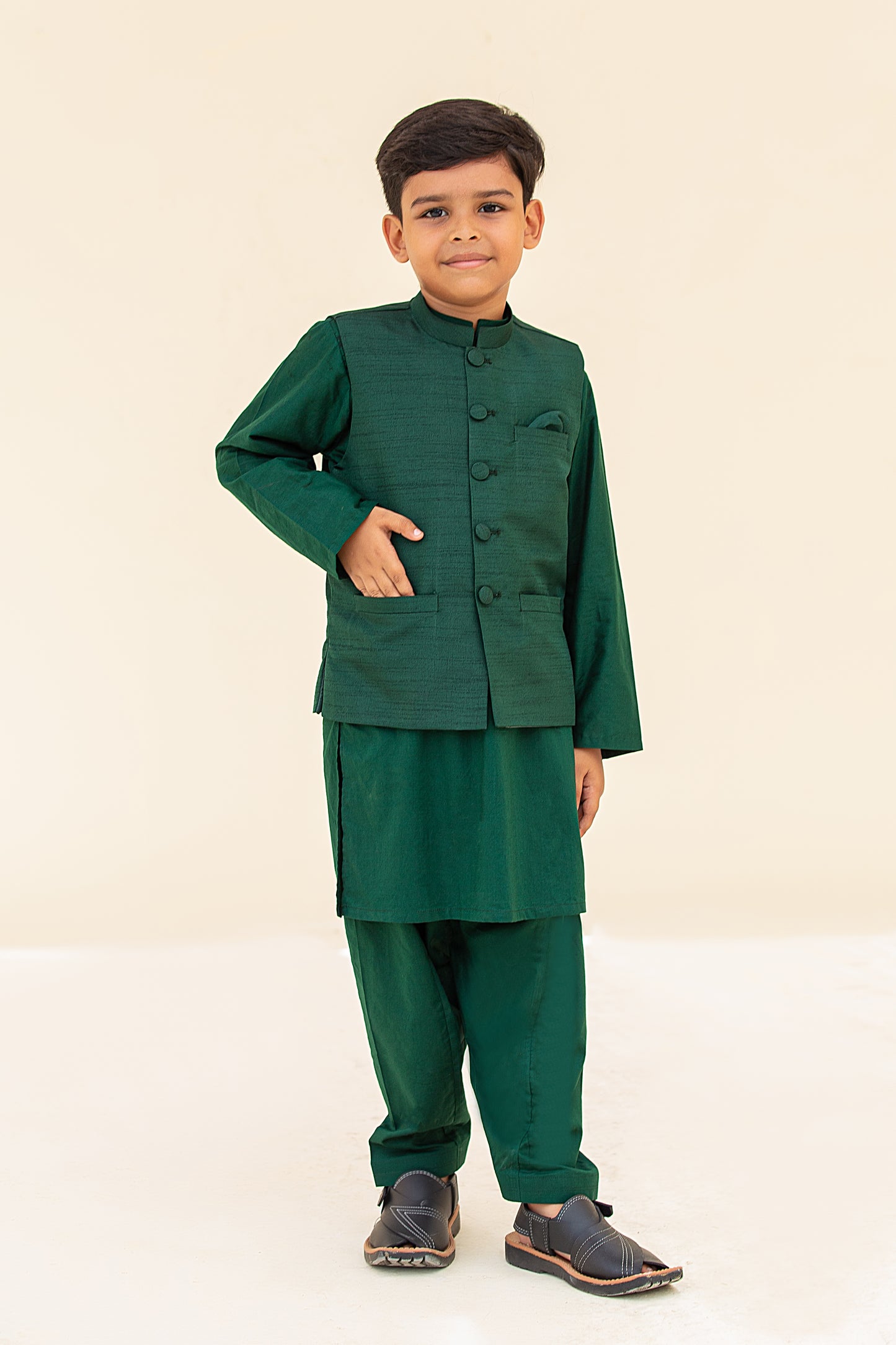 Green kurta shalwar with waistcoat. B3099