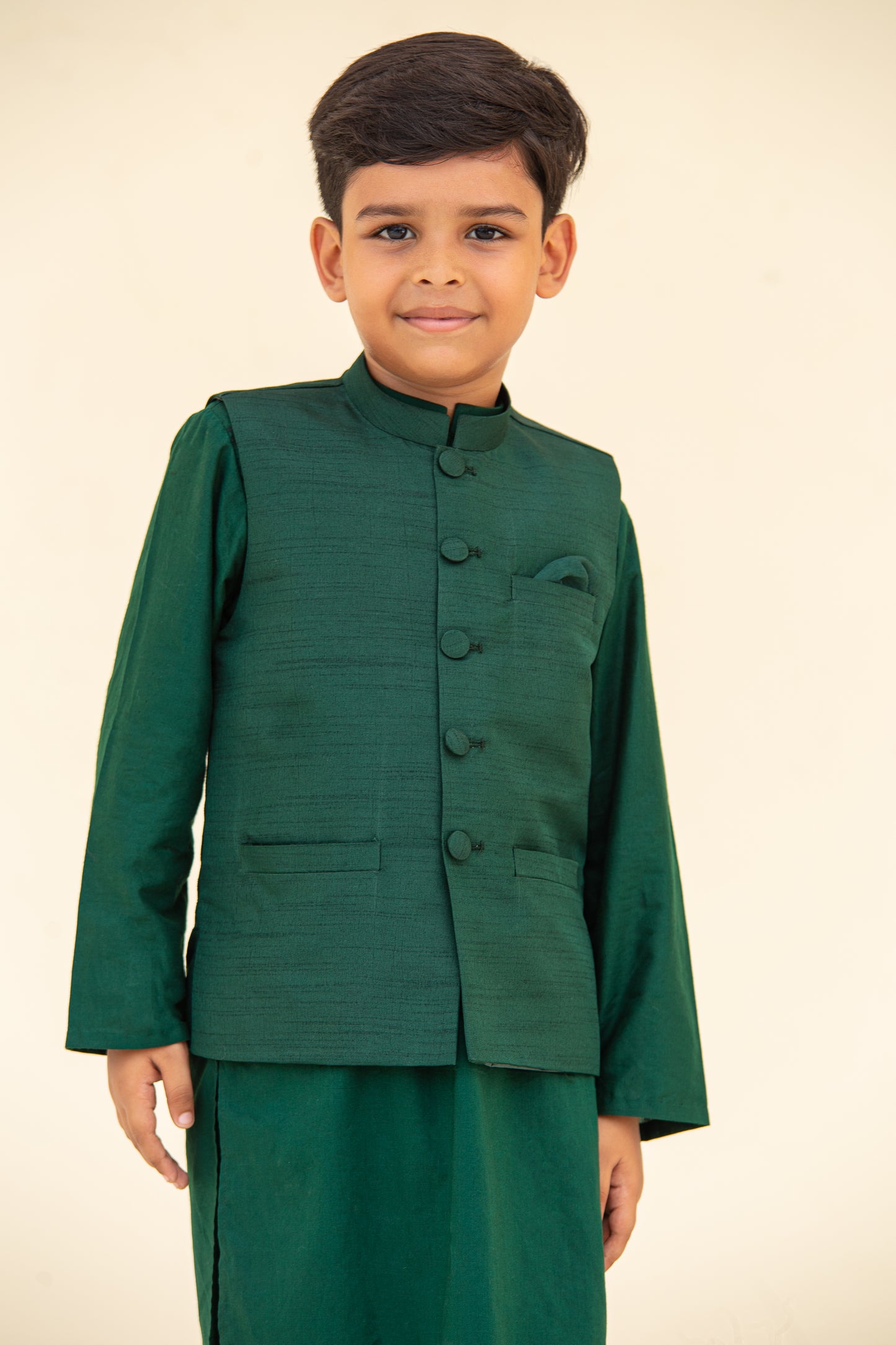 Green kurta shalwar with waistcoat. B3099