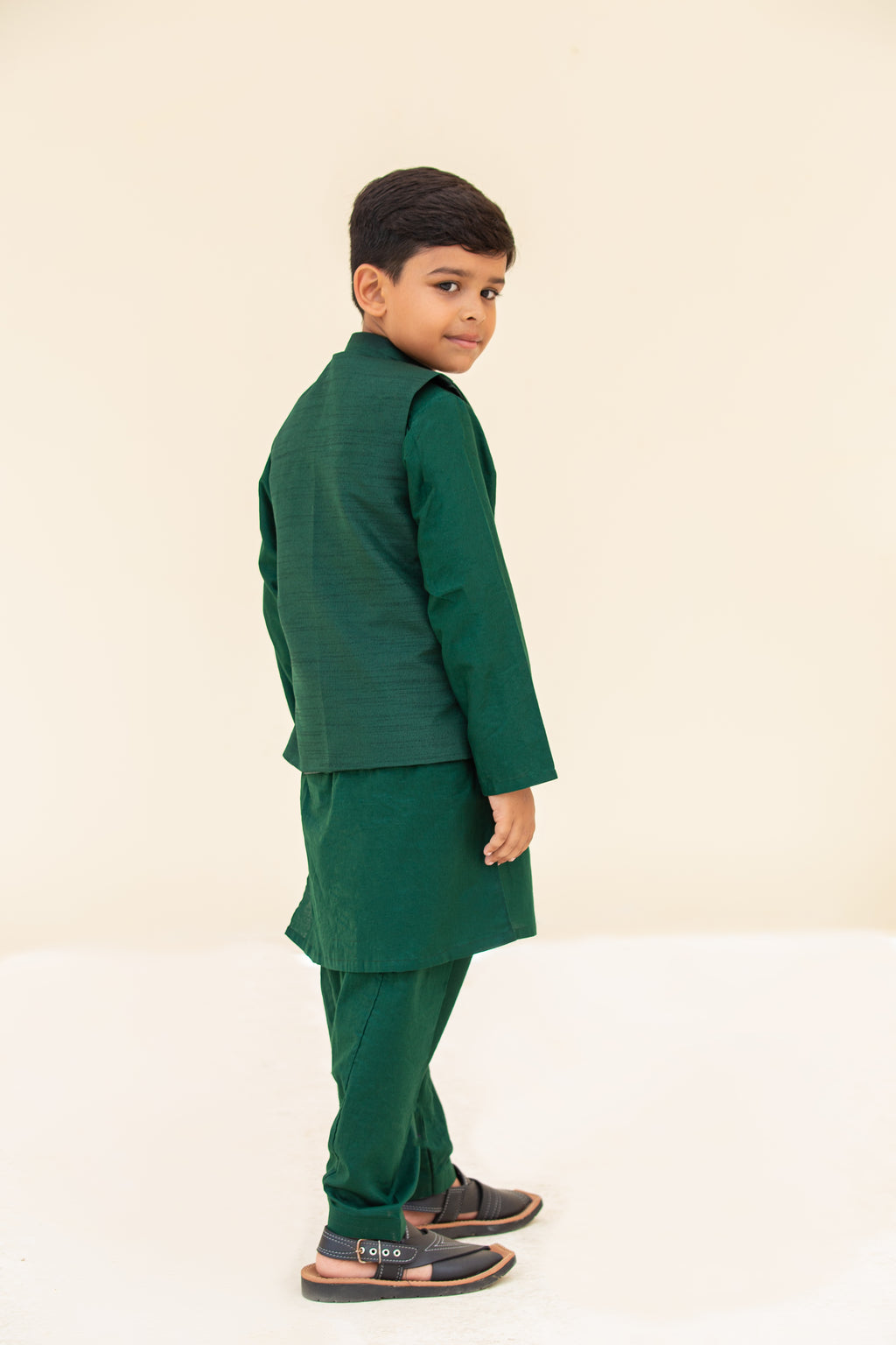 Green kurta shalwar with waistcoat. B3099
