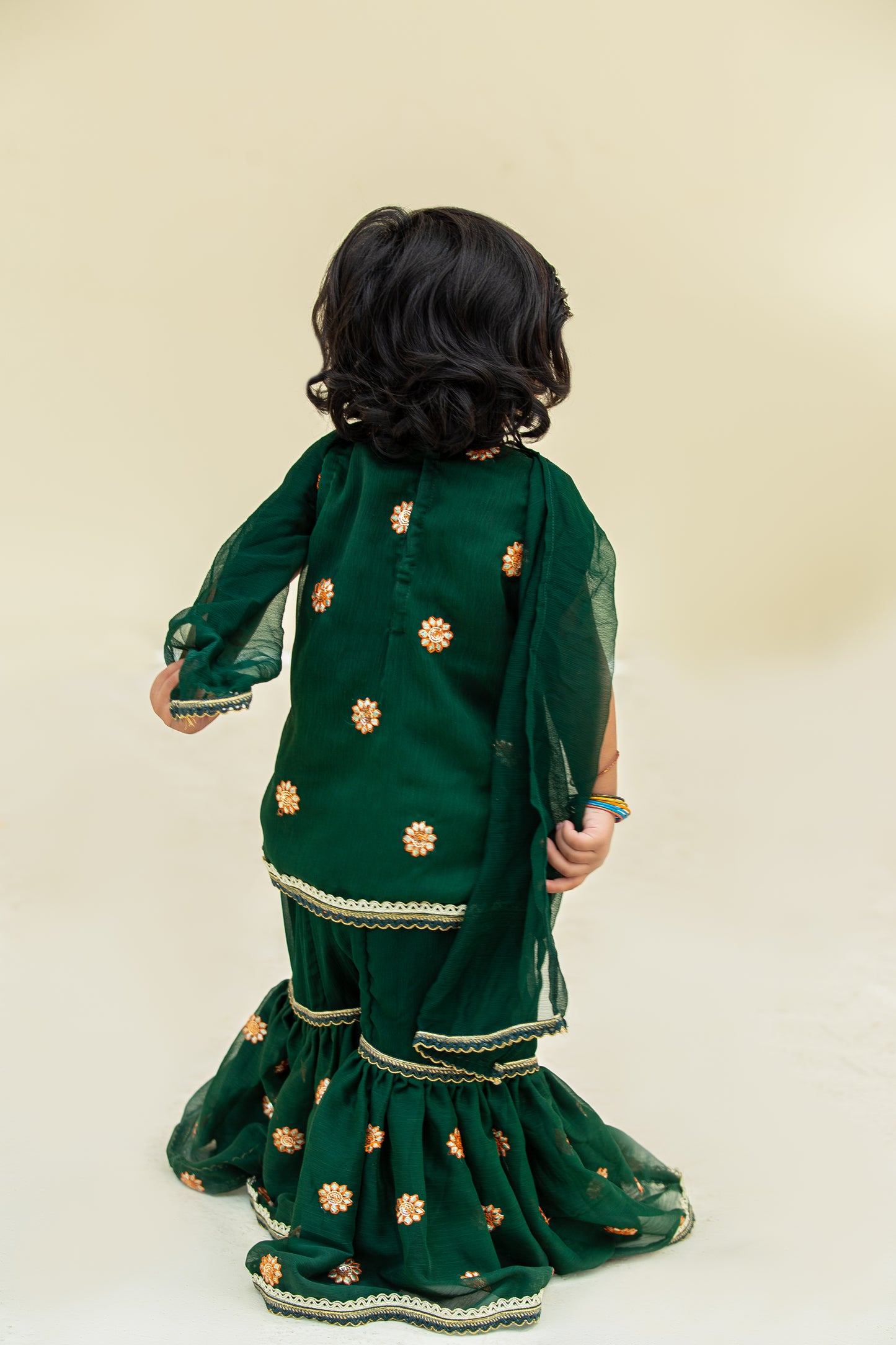 4 - piece embroidered Gharara Suit with Dupatta and Batwa.