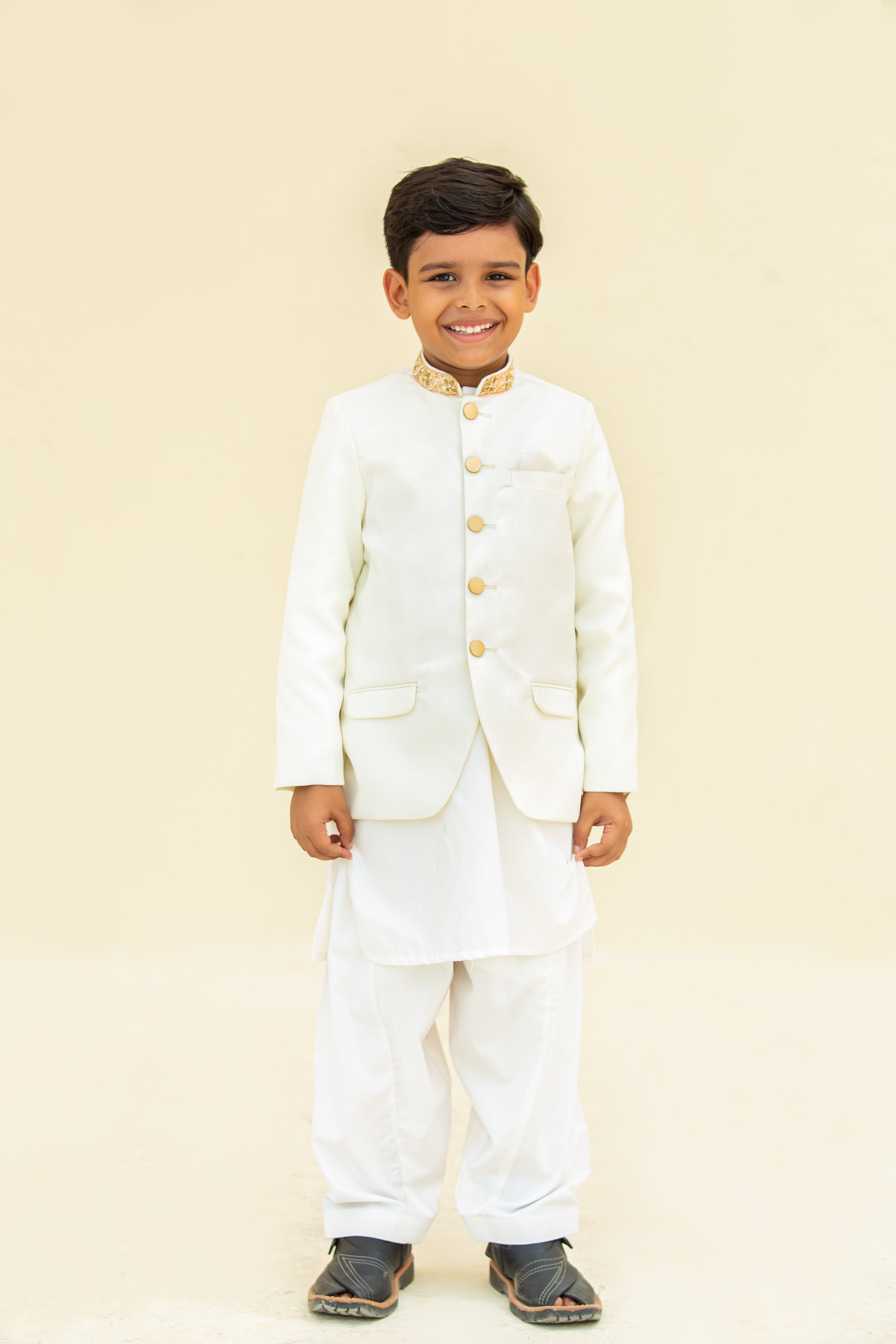White kurta shalwar with prince coat.B4011