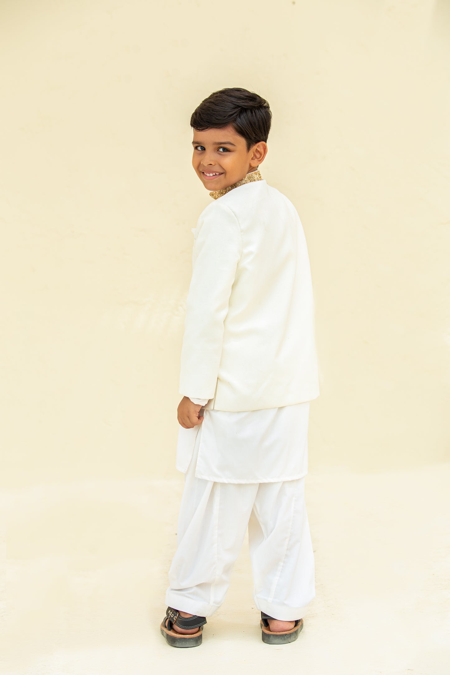 White kurta shalwar with prince coat.B4011